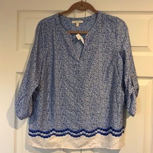 Blue and cream v-neck shirt
